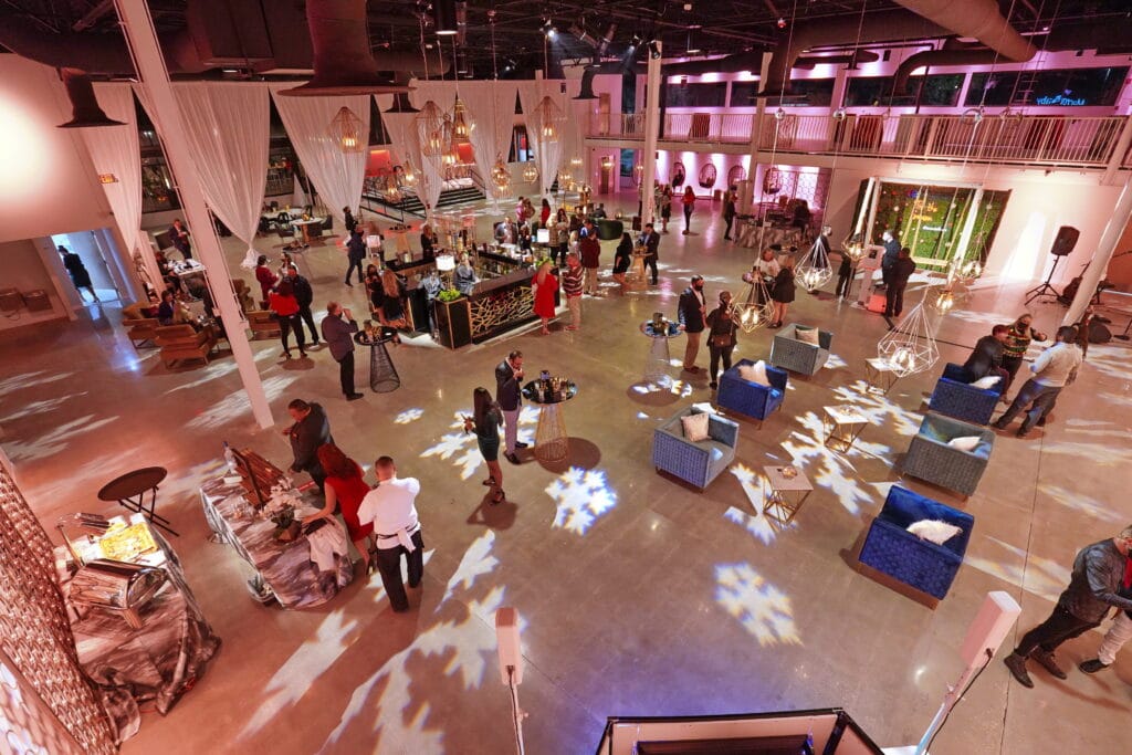 holiday party in large event space with snowflake lighting